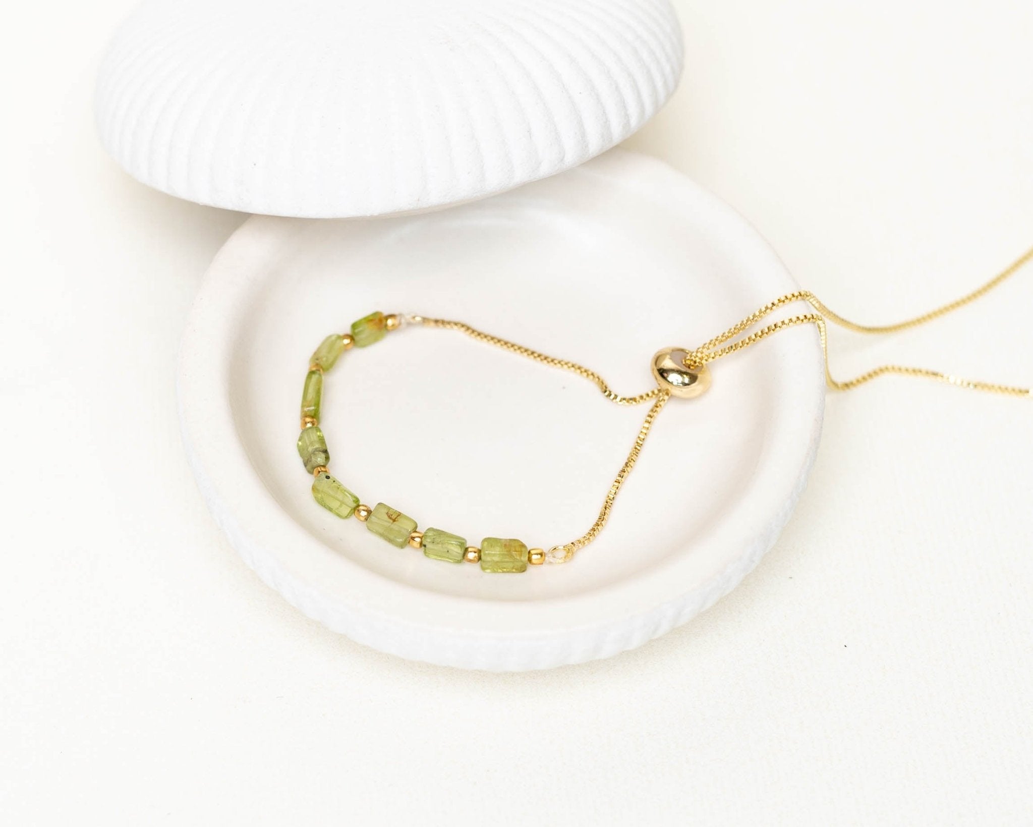 Peridot Faceted With Golden Chain Lumba - Bodh Gem and Crystals