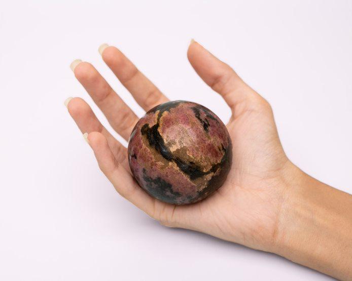 Rhodonite Ball 304.9 g - Bodh Gem and Crystals
